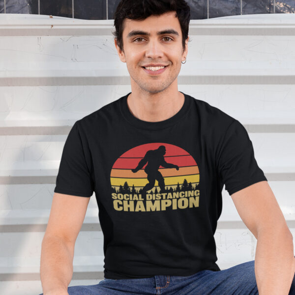 man wearing the Bigfoot Social Distancing Champion t-shirt